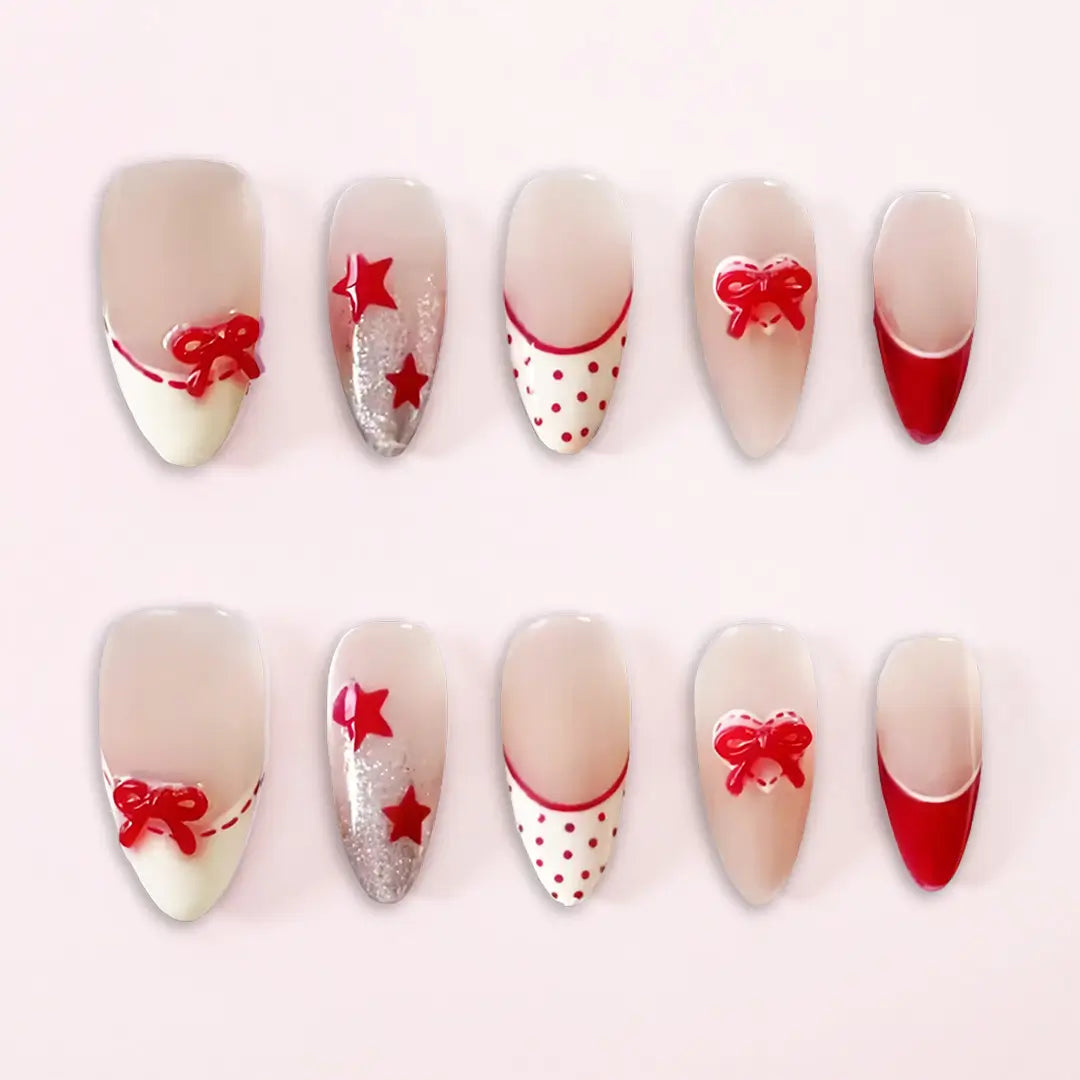 Almond-shaped press-on nails featuring soft pink and vibrant red accents